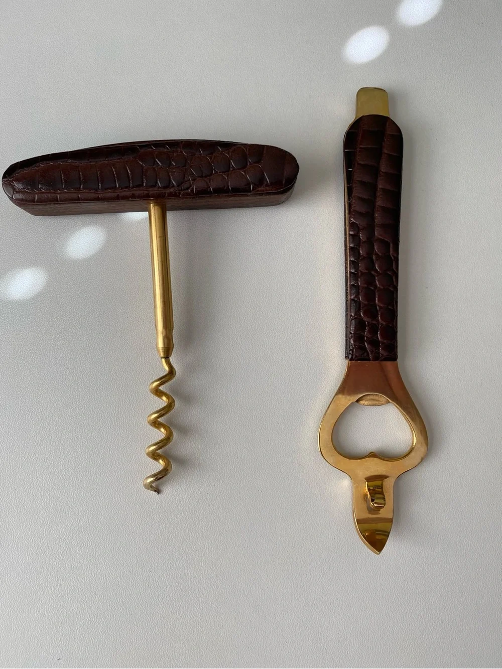 Vintage mid-century brass and faux-crocodile leather bar set.